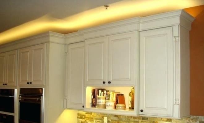 accent lighting above kitchen cabinet